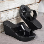 Open toe wedge sandals by Plush Fashion Hub featuring a stylish design with a comfortable platform heel and adjustable ankle strap.