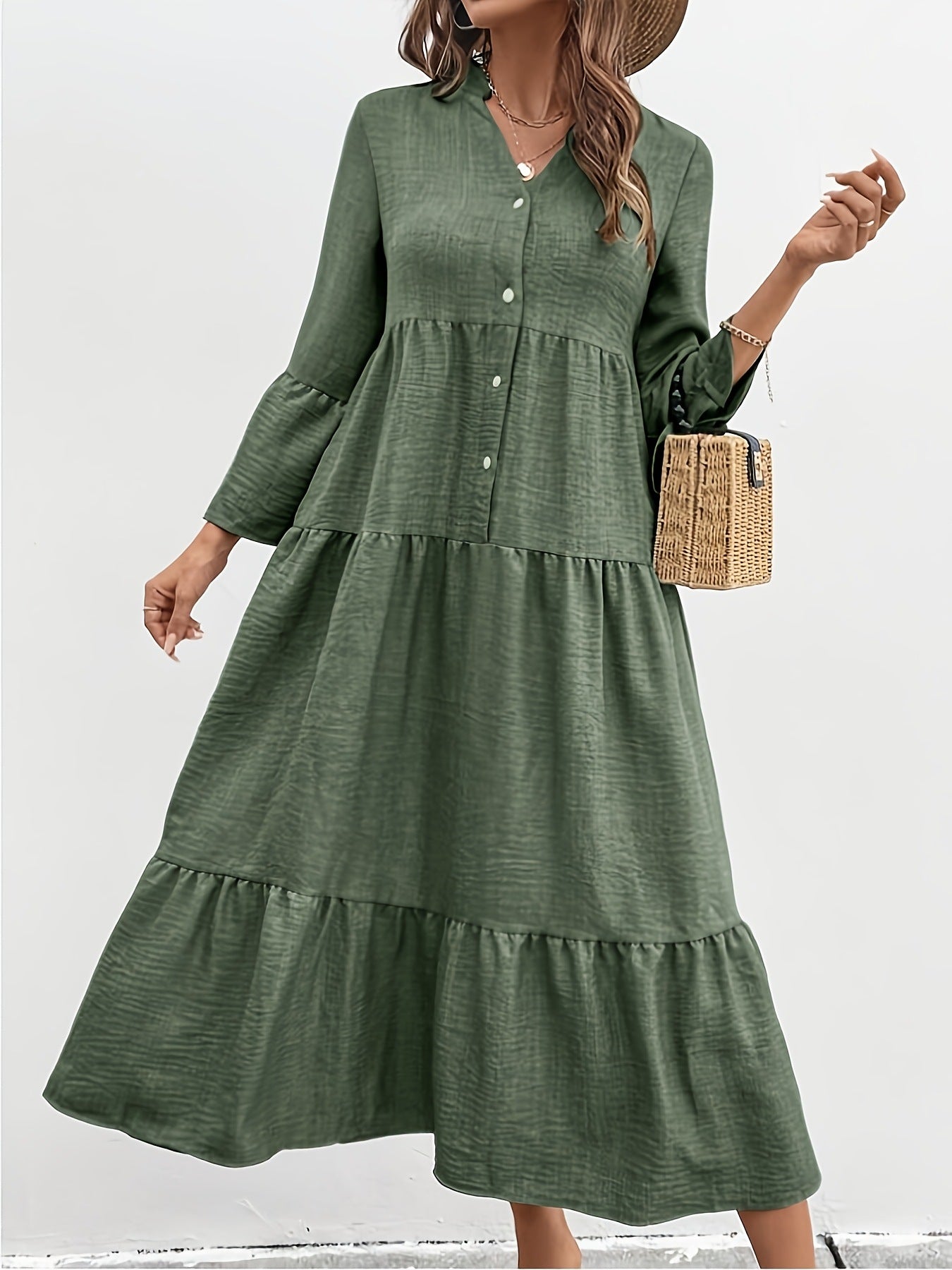 Casual cotton blend button-front tiered midi dress featuring a sleeveless summer design, perfect for warm-weather style.