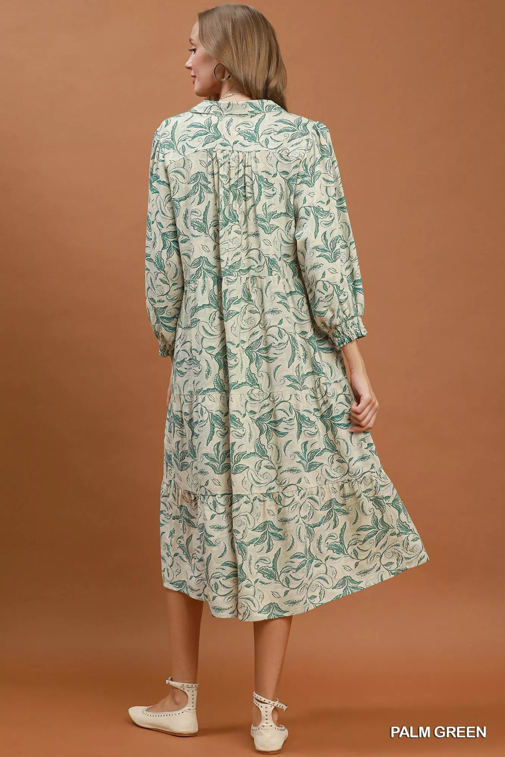 Linen botanical print tiered midi dress by Umgee featuring a relaxed fit and tiered design, perfect for casual summer wear.