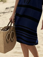 Plus size women's striped half-sleeve midi dress by Trendsi, casual chic style perfect for everyday wear.