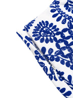 Printed tie-front women’s skort with high waist, casual trendy bottoms from Trendsi, featuring a stylish and comfortable design.