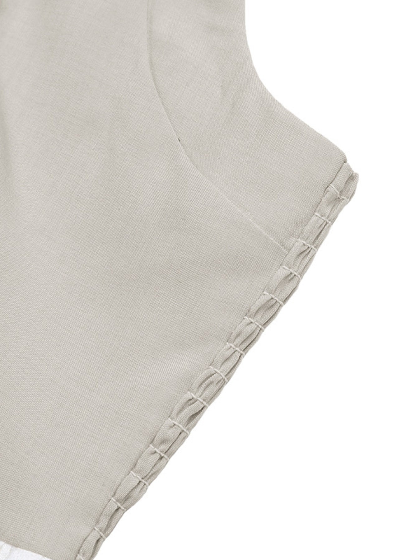 Elegant two-tone halter neck maxi dress with ruched details and side pockets, perfect for stylish occasions.