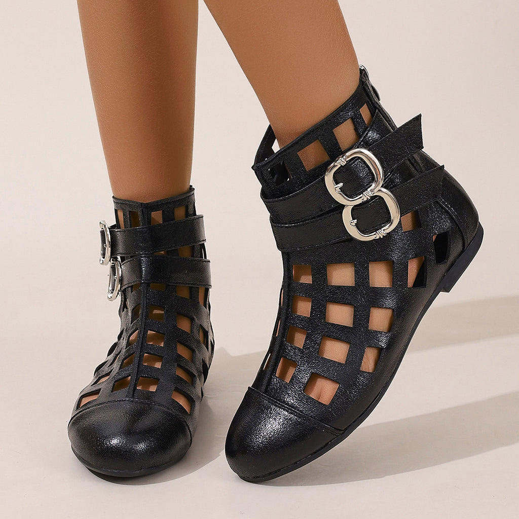 Women's round toe cutout ankle boots with low heel and stylish design, comfortable footwear by Trendsi.