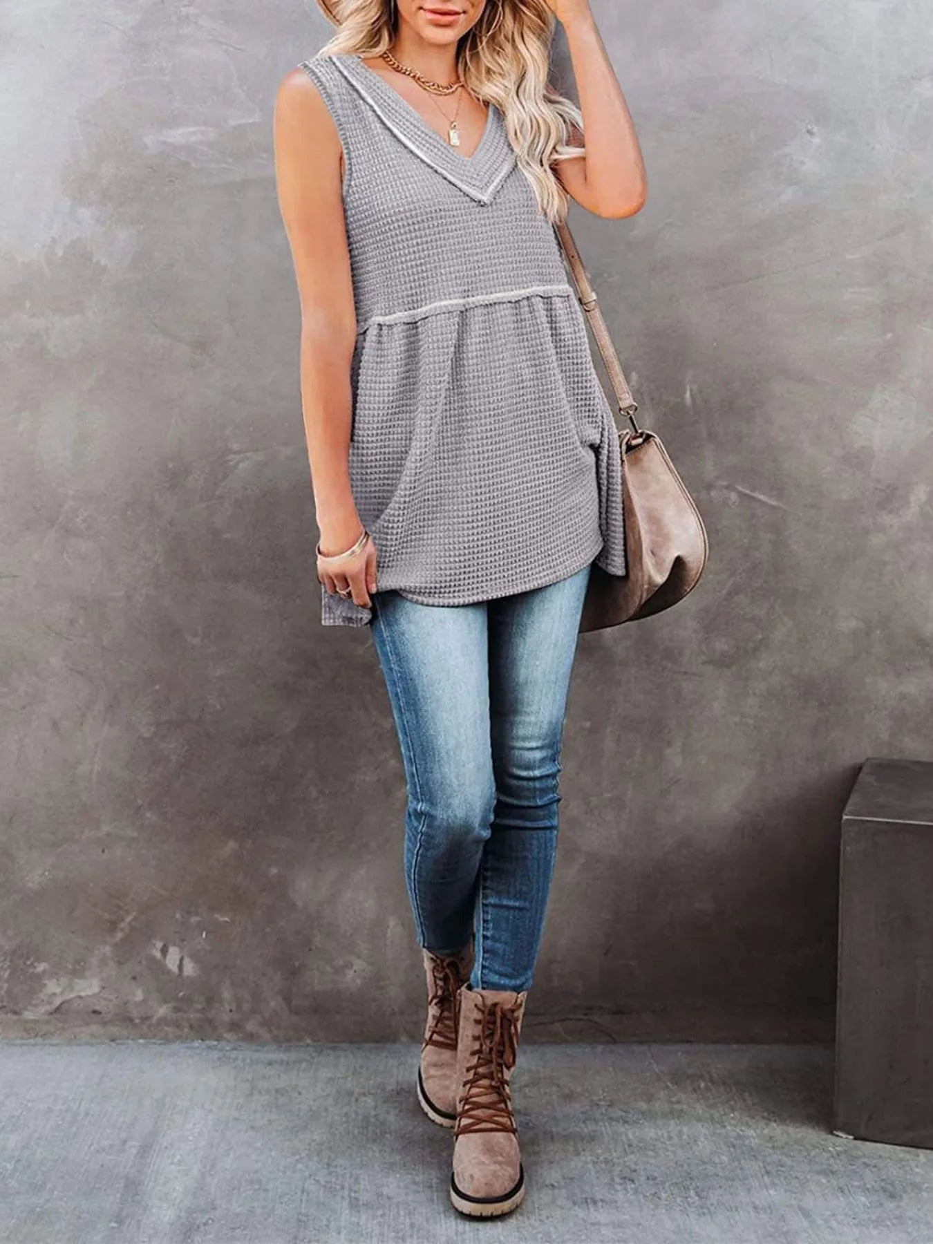 V-neck waffle knit tank top with contrast stitching, casual sleeveless top from Trendsi, shown in a neutral color.