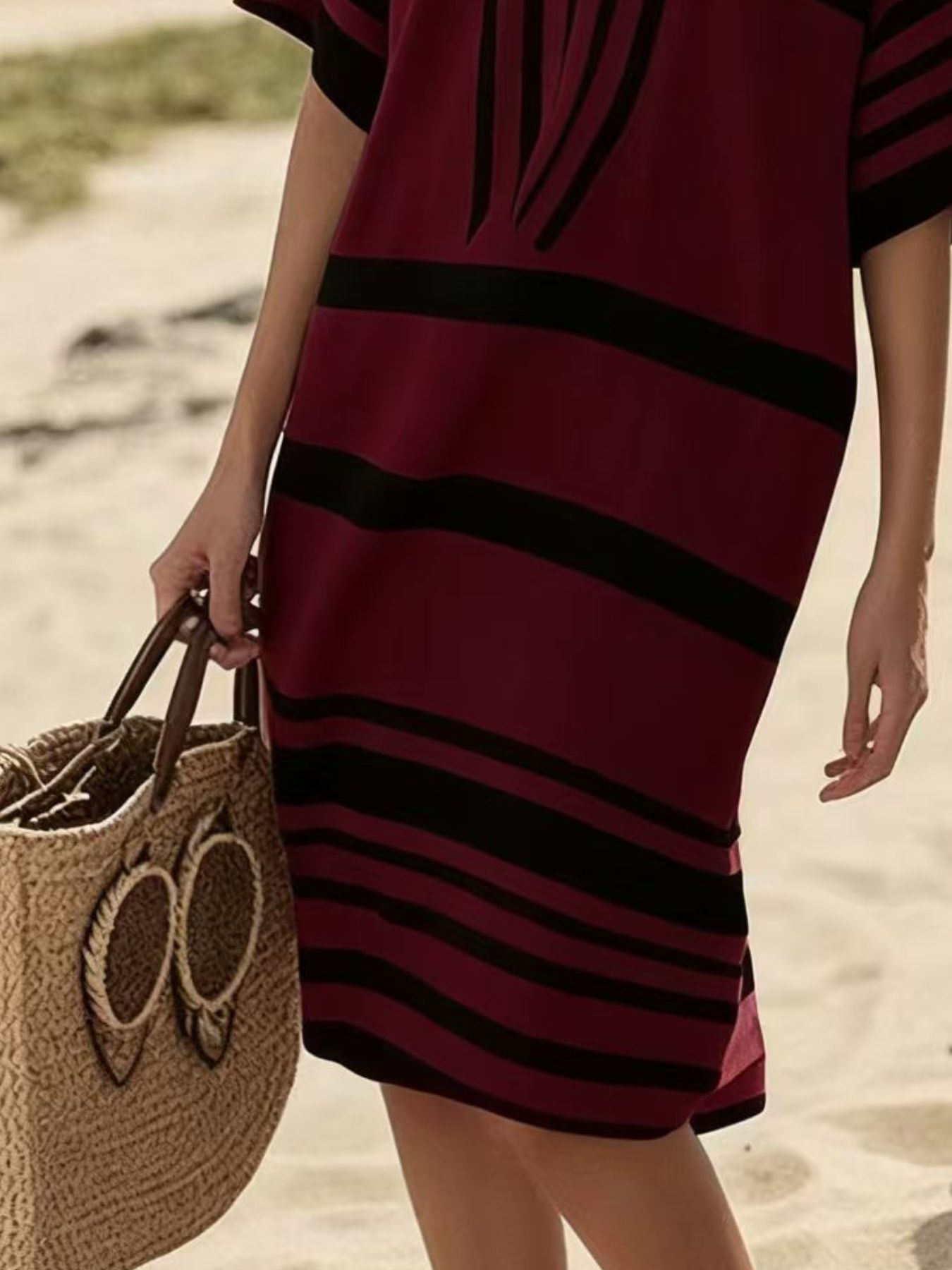 Plus size women's striped half-sleeve midi dress by Trendsi, casual chic everyday wear with a relaxed fit and stylish design.