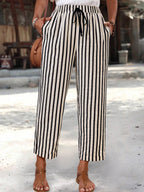 Women's striped high-waisted cropped pants with pockets, stylish and comfortable, from Trendsi.