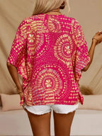Women's printed V-neck casual top by Trendsi, soft stretch fabric, half sleeves, perfect for office or casual wear.