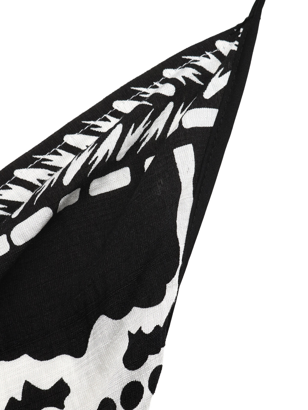 Women's printed halter neck maxi dress with tie-back detail, featuring a flowy silhouette and vibrant floral pattern.