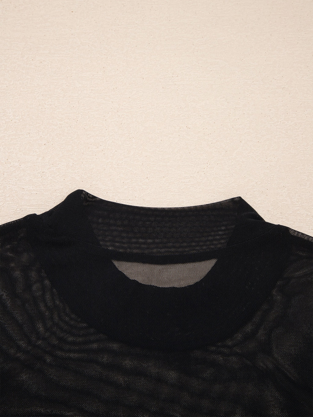 Women's sheer mesh patchwork cap sleeve T-shirt by Trendsi, featuring elegant layering design and lightweight, stylish fabric.