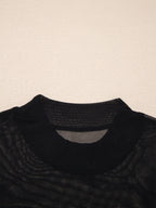 Women's sheer mesh patchwork cap sleeve T-shirt by Trendsi, featuring elegant layering design and lightweight, stylish fabric.