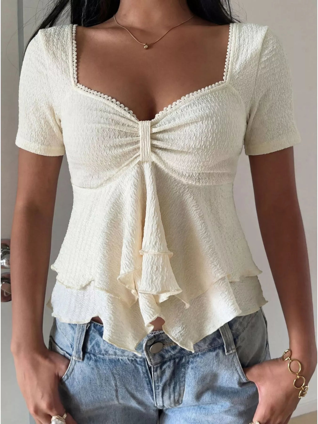 Sweetheart neck layered ruffle top by Trendsi featuring a feminine design with layered ruffles and a flattering neckline.