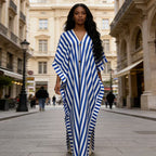 African-inspired striped loose long dress by FitiqueFit, featuring vibrant colors and a relaxed, flowing silhouette.