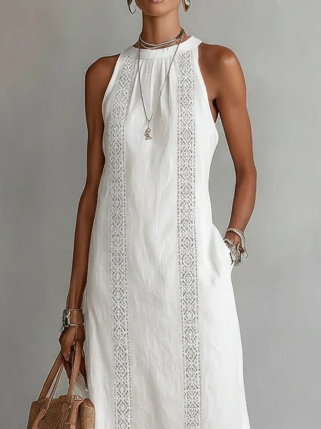 Sleeveless hollow-out midi dress with side slit and pockets by Trendsi, featuring a stylish cut and lightweight fabric.