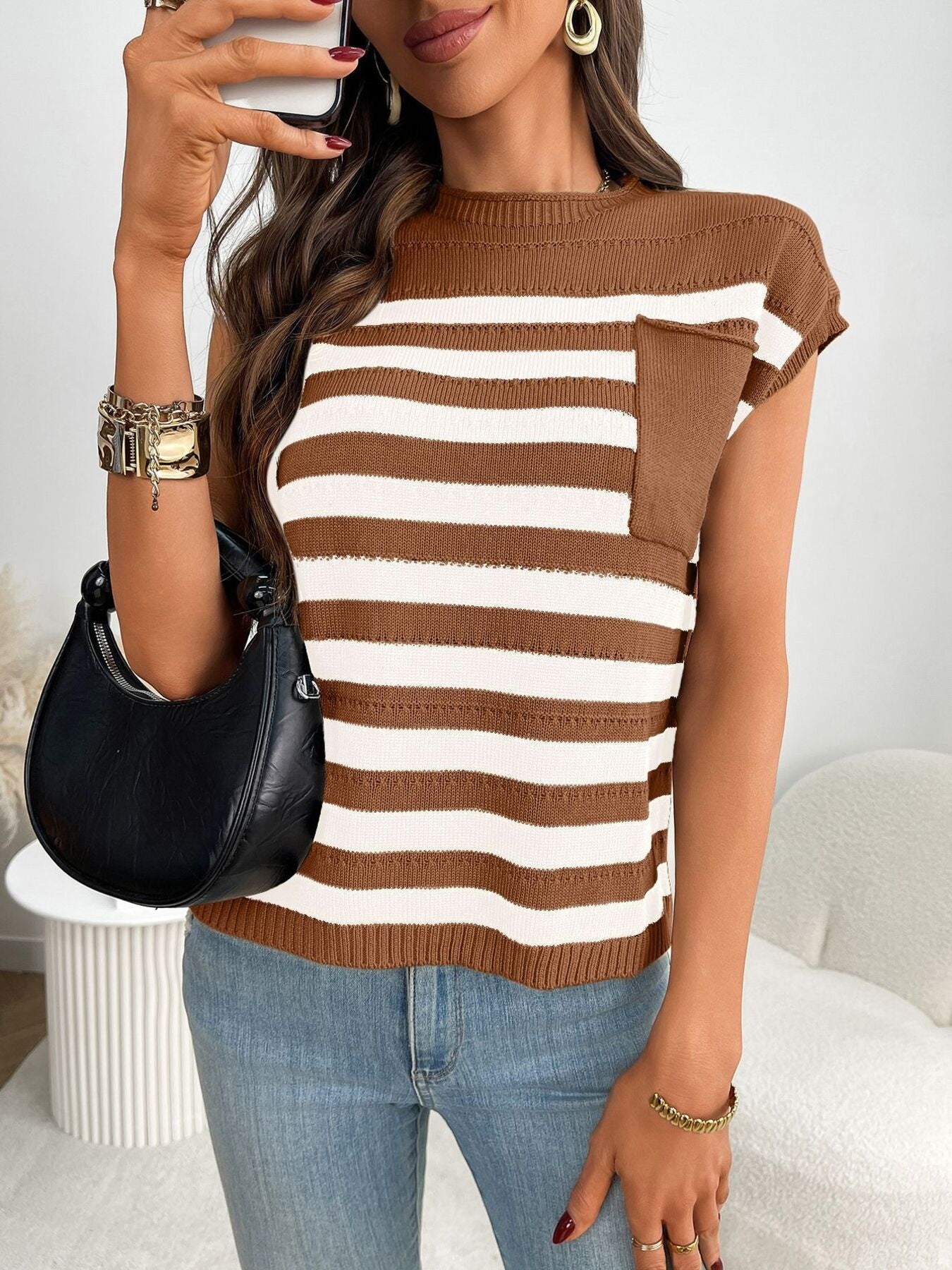 Women's striped knit cap sleeve sweater with pocket detail by Trendsi, featuring a fitted design and casual style.