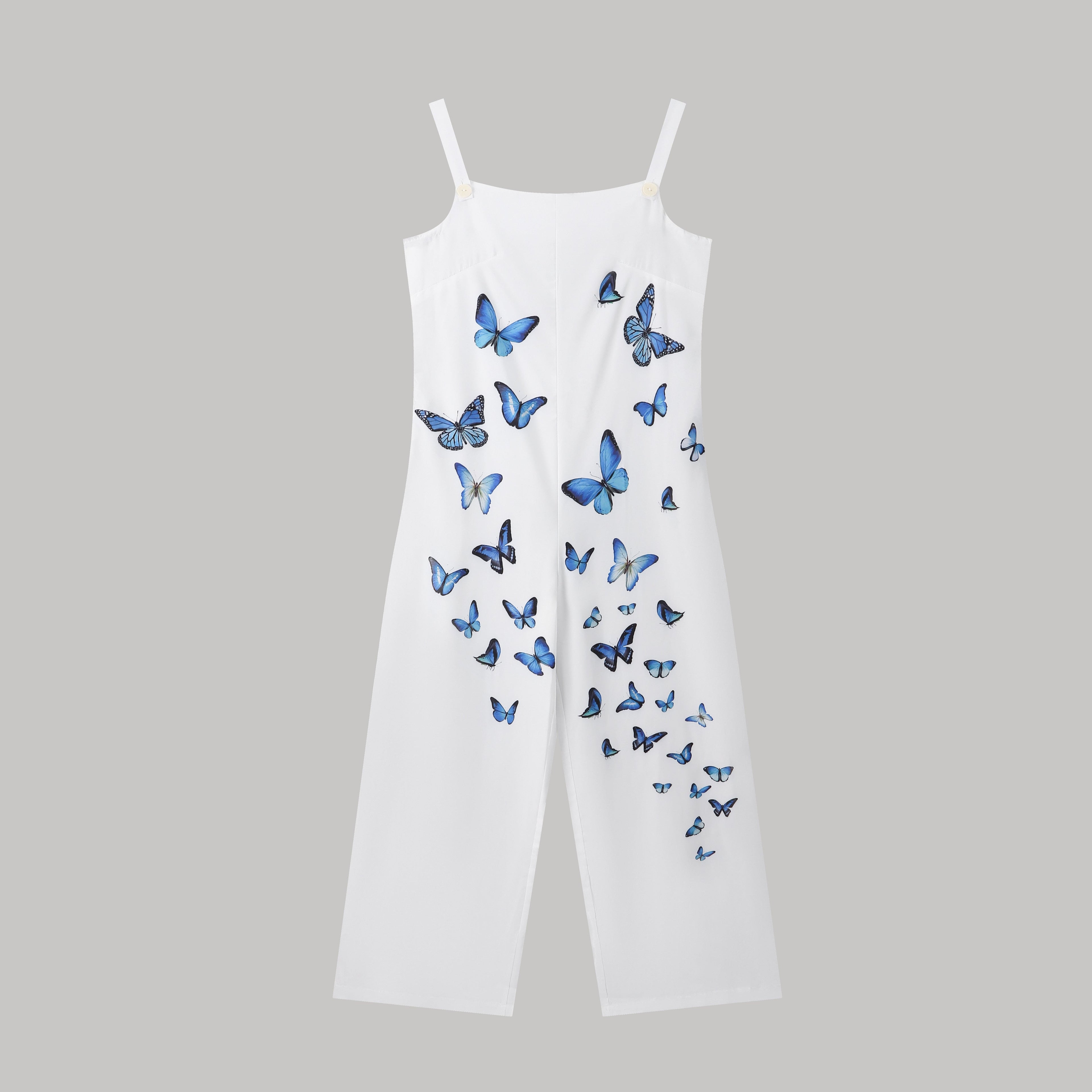 White wide-leg jumpsuit with thin straps and scattered blue butterfly print.
