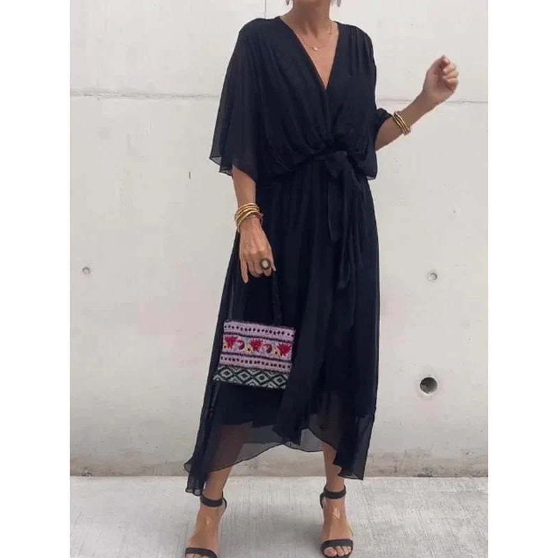 Plush Fashion Hub batwing sleeve V-neck midi dress with tied irregular hem, flowing fairy dress style for elegant everyday wear.