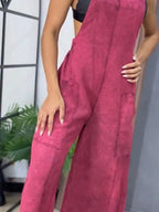 Full size wide leg denim overalls by Trendsi, featuring a one-piece design with adjustable straps and front pockets.