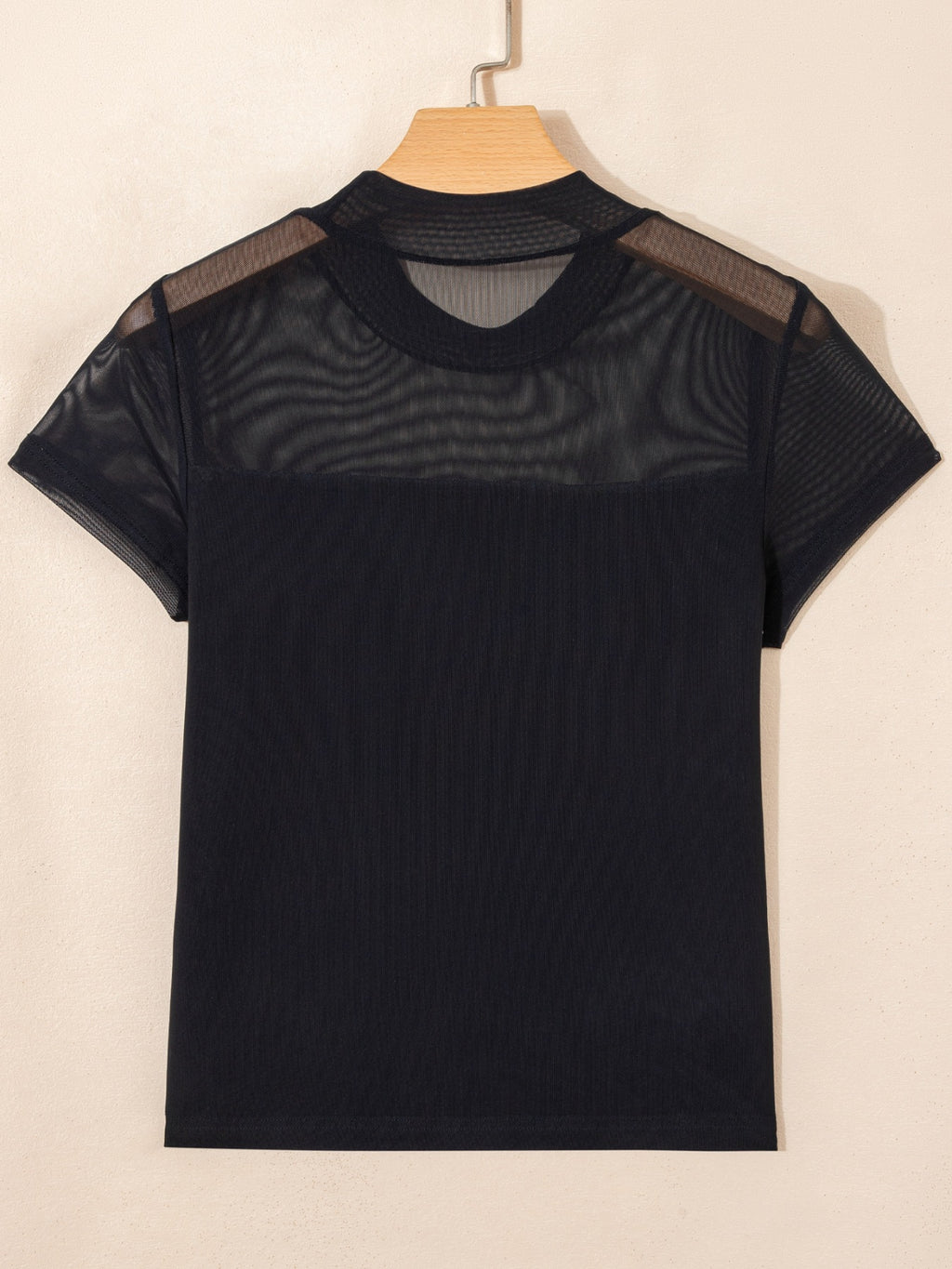 Women's sheer mesh patchwork cap sleeve T-shirt by Trendsi, featuring a stylish layered design and elegant lightweight fabric.