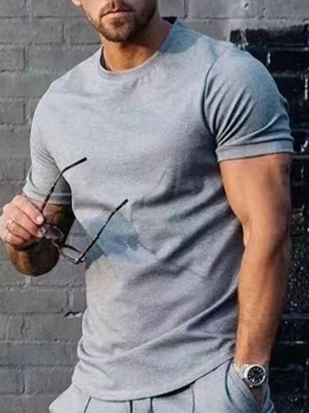 Plus size men's casual T-shirt in solid color from Trendsi, featuring a comfortable fit and simple design.