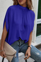 Elegant Trendsi tie-back half-sleeve blouse with side slit, featuring a stylish design and soft fabric for a sophisticated look.