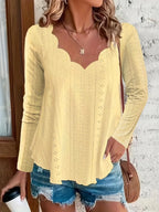 Elegant women's eyelet long sleeve blouse by Trendsi, featuring stretchy fabric and versatile design for office wear.