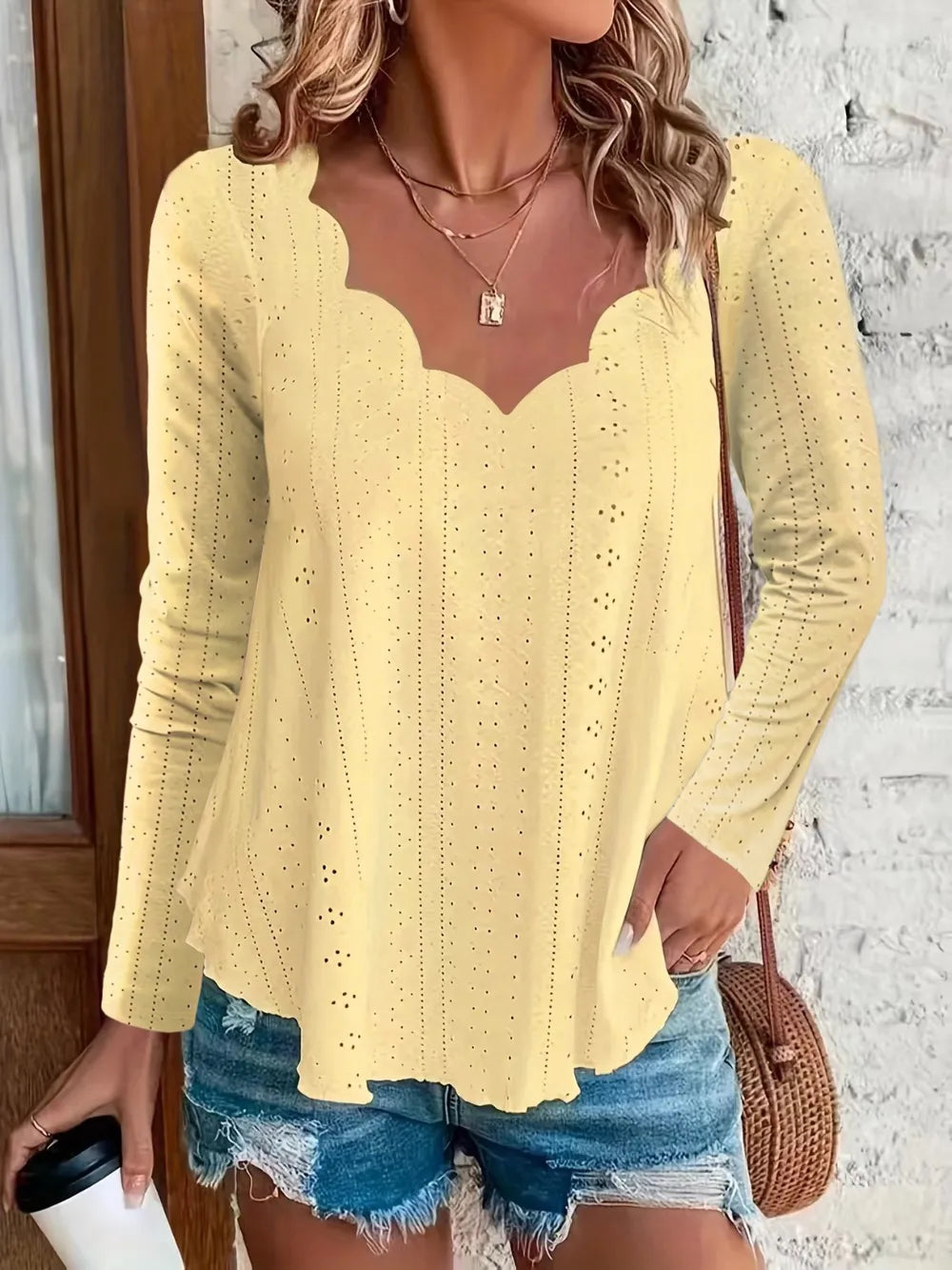 Elegant women's eyelet long sleeve blouse by Trendsi, featuring stretchy fabric and versatile design for office wear.