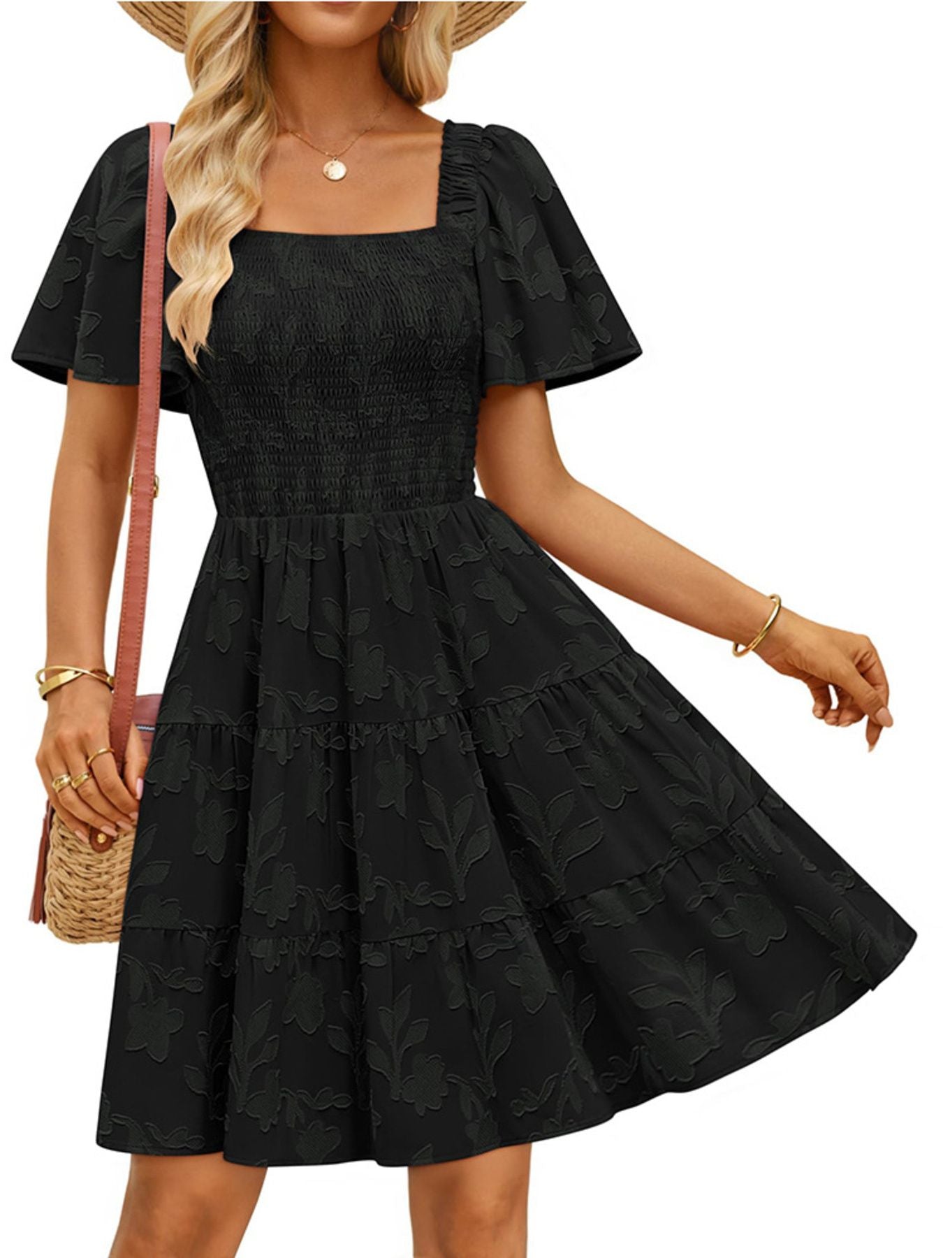 Women's smocked tiered square neck casual dress with short sleeves and pockets by Trendsi, featuring a feminine and relaxed style.