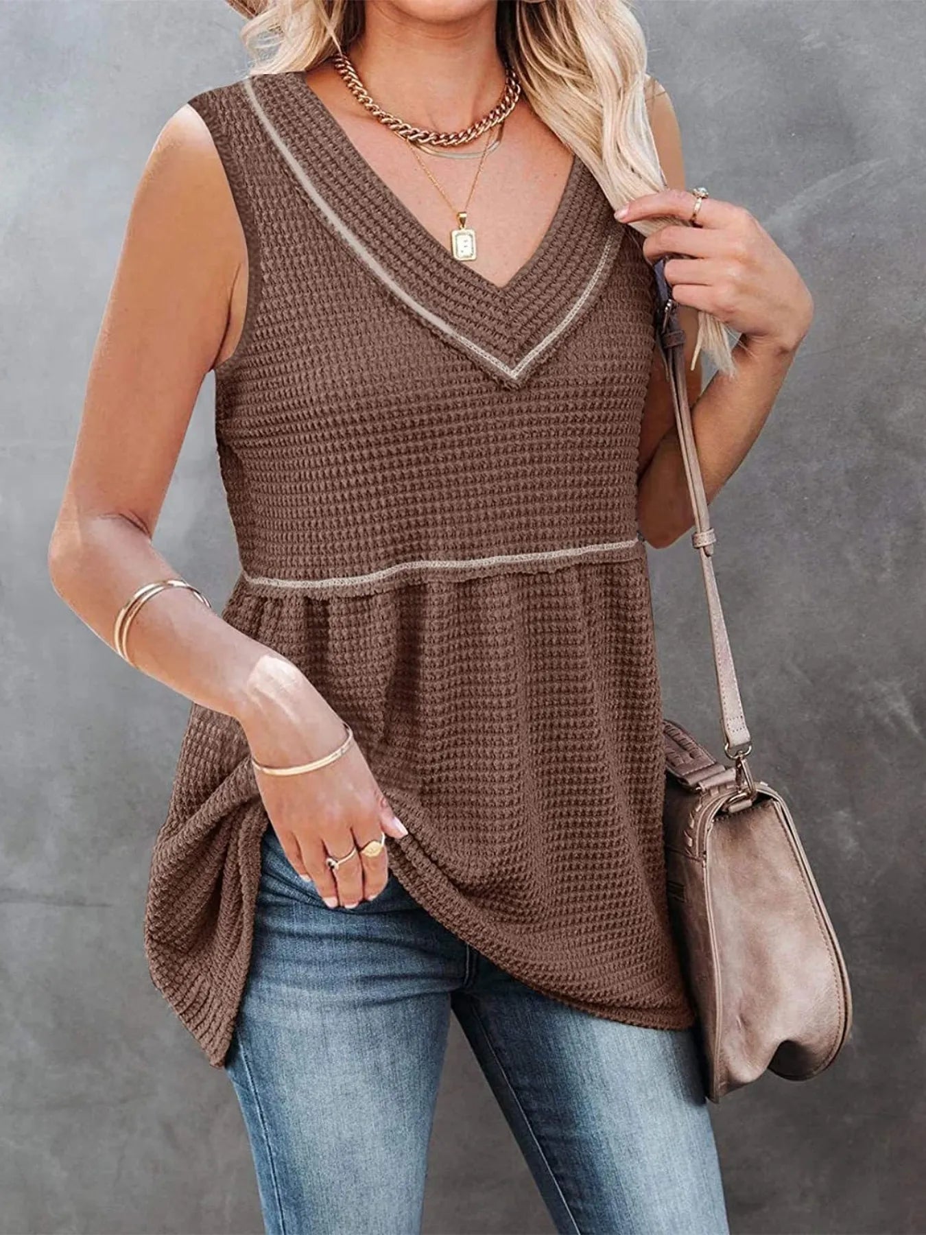 V-neck waffle knit tank top with contrast stitching, trendy sleeveless top by Trendsi, shown in a close-up view.