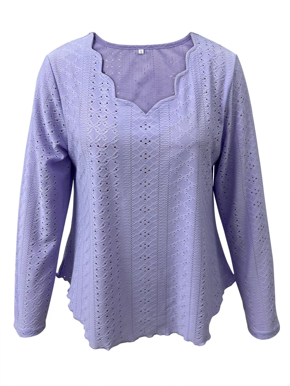 Elegant women's eyelet long sleeve blouse by Trendsi, featuring a versatile, stretchy office top with eyelet detailing and long sleeves.