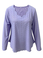 Elegant women's eyelet long sleeve blouse by Trendsi, featuring a versatile, stretchy office top with eyelet detailing and long sleeves.