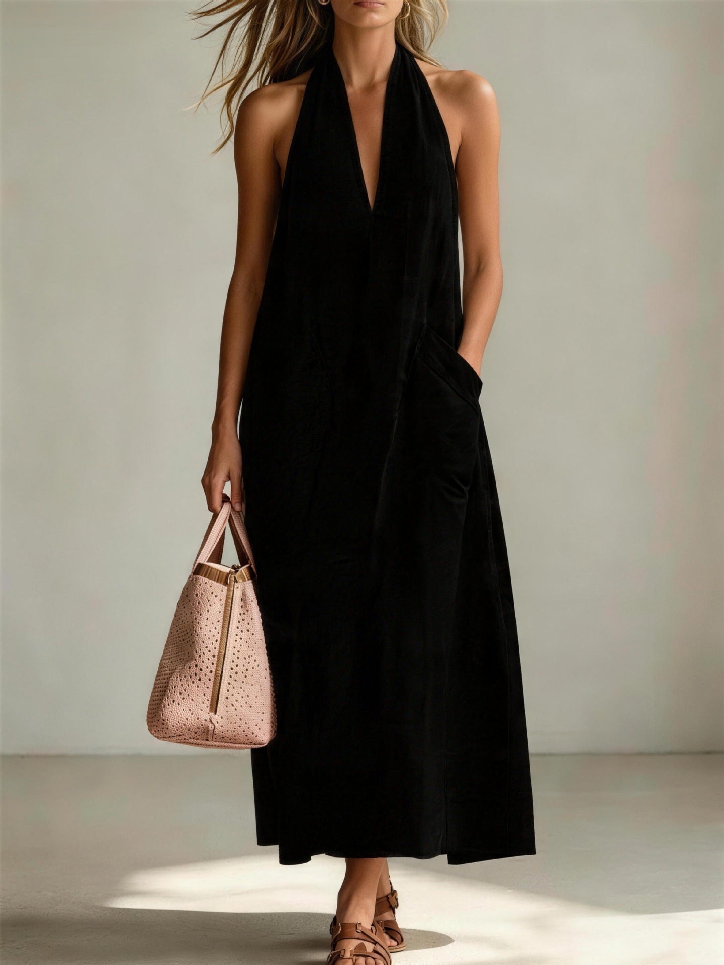 Casual FitiqueFit cotton halterneck sleeveless dress with deep V-neck and loose straight-line fit, perfect for warm weather.