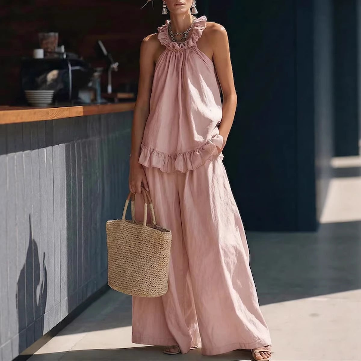 FitiqueFit halterneck loose two-piece casualwear set with pleated design and asymmetric pockets, perfect for stylish, relaxed looks.