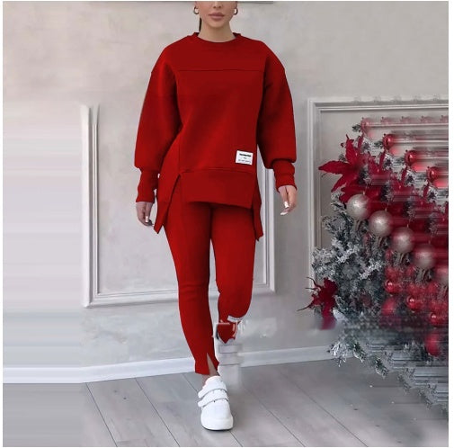 Women's solid color 2-piece casualwear set by FitiqueFit, featuring a matching top and pants in a relaxed fit.