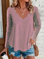 Elegant women's eyelet long sleeve blouse by Trendsi, featuring a stretchy, versatile office top design with eyelet details.