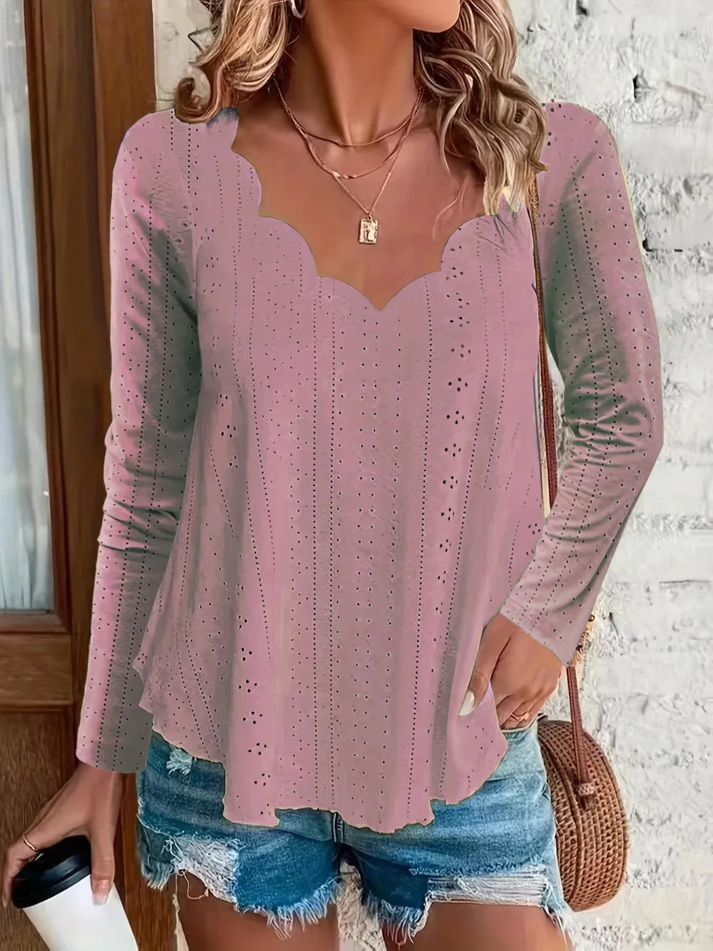 Elegant women's eyelet long sleeve blouse by Trendsi, featuring a stretchy, versatile office top design with eyelet details.