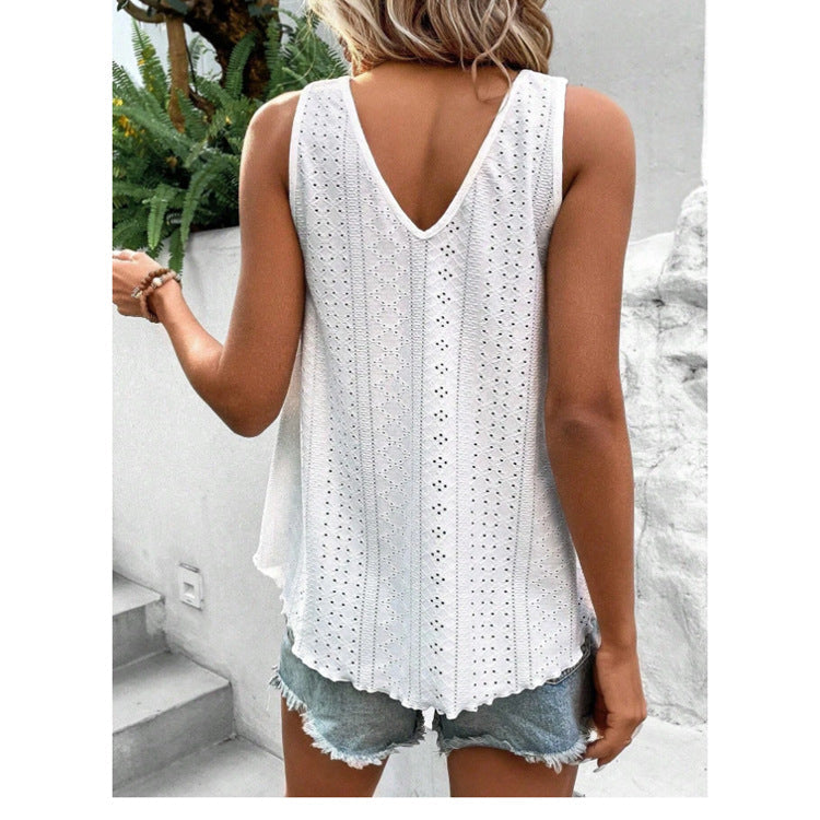 White sleeveless eyelet tank top with a V-neck, paired with denim cutoff shorts, viewed from the back.