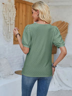 Light gray eyelet asymmetrical neck short sleeve T-shirt from Trendsi, featuring unique neckline and casual fit.