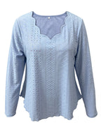 Elegant women's eyelet long sleeve blouse by Trendsi featuring a versatile stretchy design, perfect for office or casual wear.