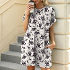 Floral print loose casual dress with round neck, short sleeves, and pockets by FitiqueFit, perfect for relaxed summer wear.