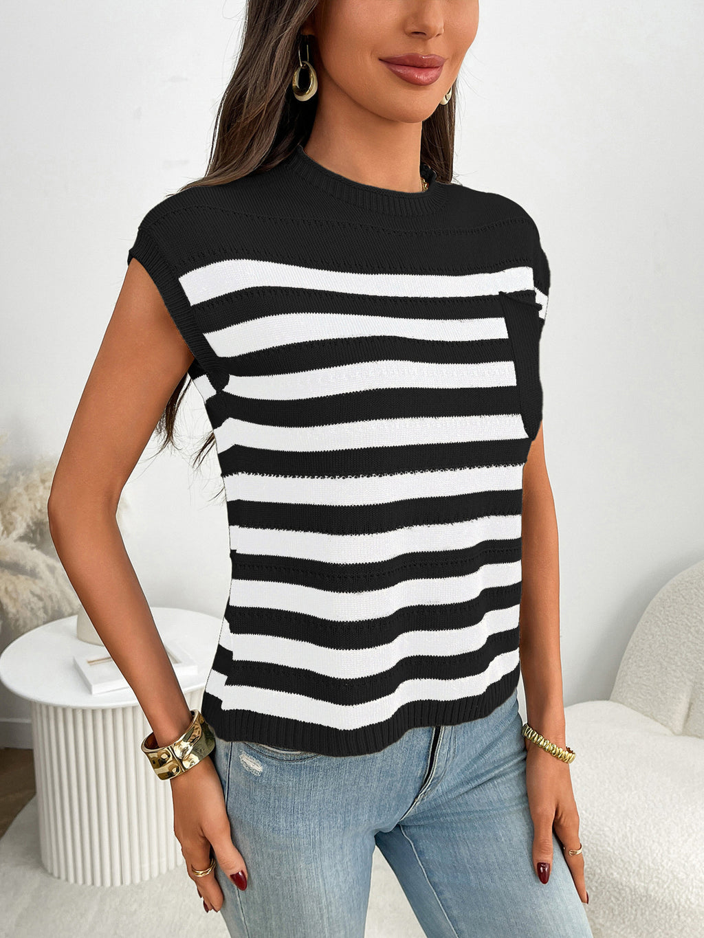 Women's striped knit cap sleeve sweater with pocket detail, casual trendy top from Trendsi, soft fabric and stylish design.