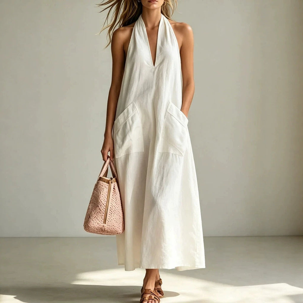 Cotton halterneck sleeveless dress by FitiqueFit featuring a deep V-neck and loose straight-line style for casual wear.