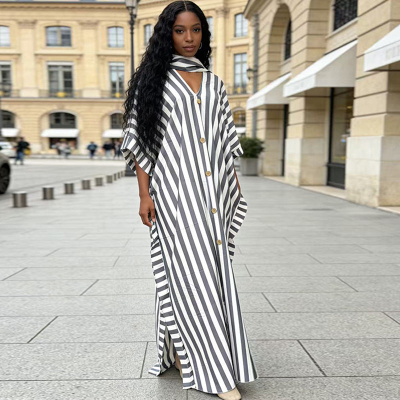 African-inspired striped loose long dress by FitiqueFit in seven colors, featuring a relaxed fit and vibrant pattern.