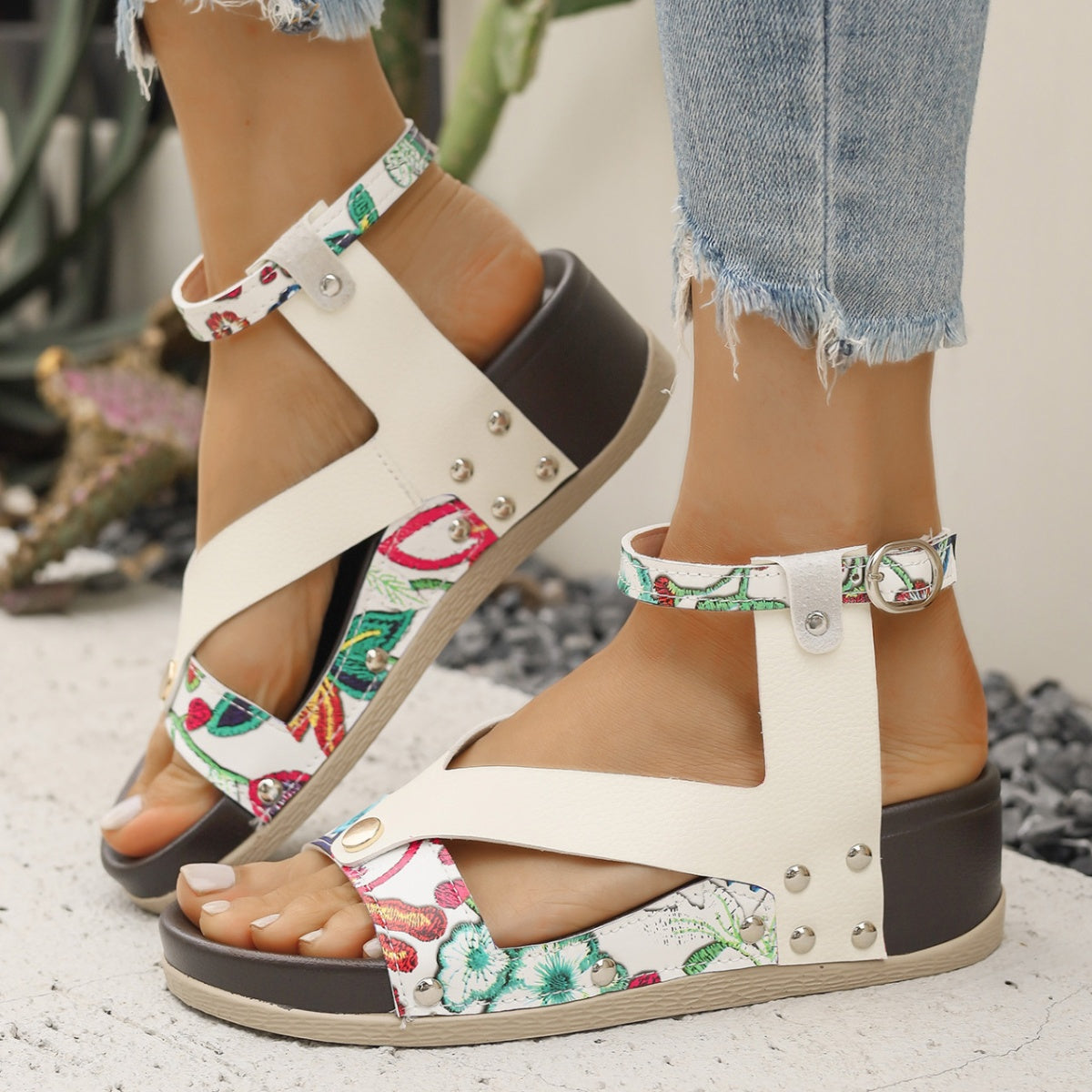 Women's leopard print wedge sandals with ankle straps from Trendsi, featuring a comfortable summer design and stylish footwear.