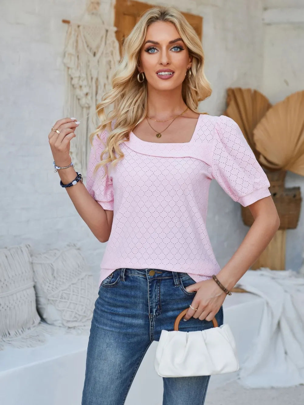 Trendsi eyelet asymmetrical neck short sleeve T-shirt with a stylish design, featuring eyelet details and a modern neckline.