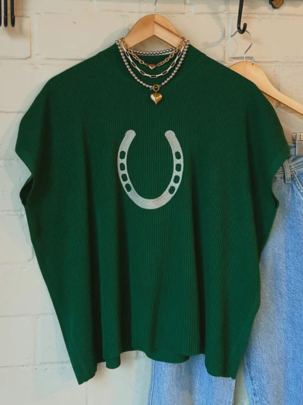 Women's ribbed knit short sleeve sweater with horsehoe graphic design, trendy and cozy from Trendsi.