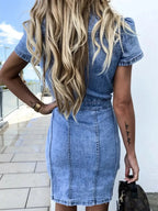 Button-front short sleeve denim midi dress by Trendsi, featuring soft stretch fabric and casual style, perfect for everyday wear.
