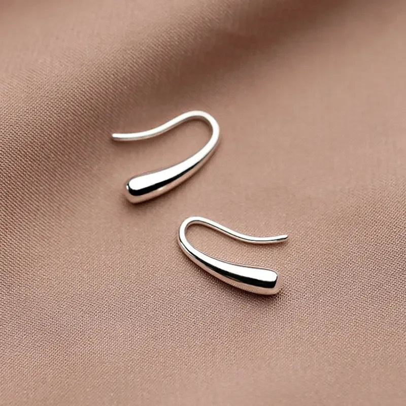 Elegant minimalist drop earrings in lightweight sterling silver, featuring simple and stylish design for women's jewelry.