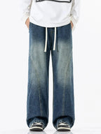 Men's vintage wash wide-leg drawstring jeans from Trendsi, relaxed fit cotton denim with a casual, laid-back style.
