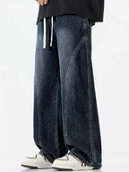 Men's vintage wash wide-leg drawstring jeans by Trendsi, relaxed fit cotton denim with a casual, comfortable style.