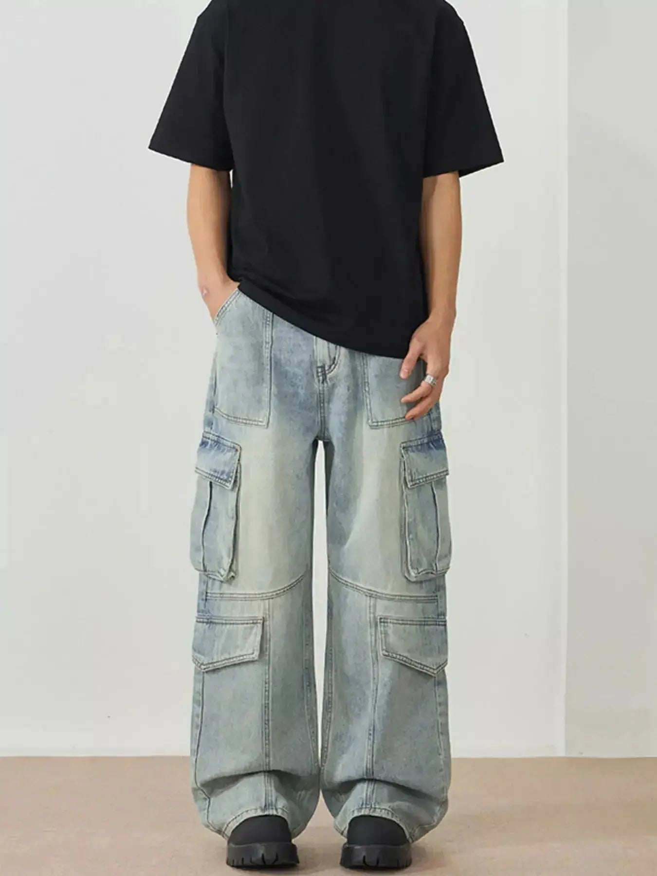 Men's wide leg cargo utility jeans by Trendsi featuring relaxed fit streetwear denim with multiple pockets and a casual, comfortable style.